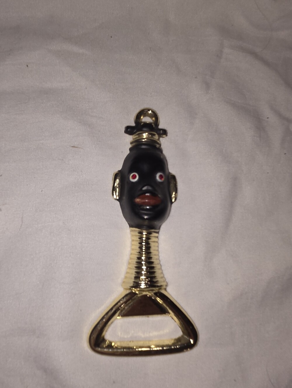 Black and Gold Decorative Bottle Opener With Red Rhinestone Eyes